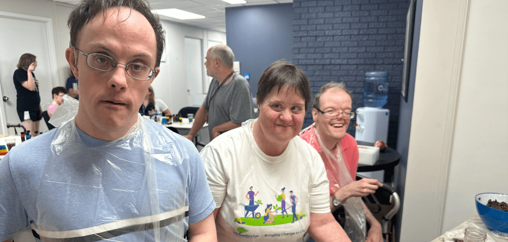 Willowbridge participants smiling at event.